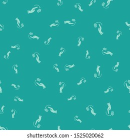 Green Human hand throwing game dice icon isolated seamless pattern on green background.  Vector Illustration