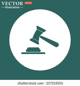 The green icon on a white circle on a green background. judge or auction hammer.  Vector illustration EPS 10