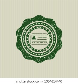 Green identification card icon inside distressed rubber grunge stamp