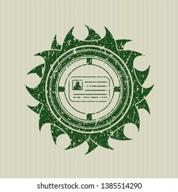 Green identification card icon inside distress rubber texture
