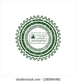 Green identification card icon inside distress rubber seal