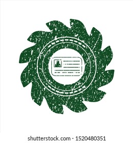 Green identification card icon inside distressed rubber grunge texture stamp
