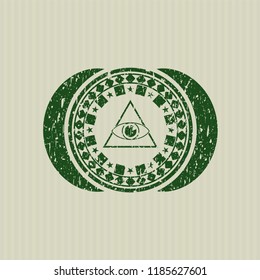 Green illuminati pyramid icon inside rubber texture