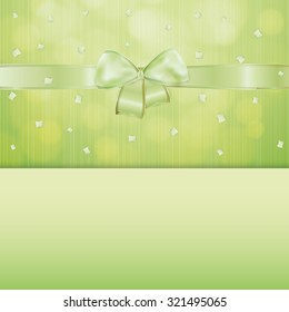 green invitation card or gift card with ribbon and confetti