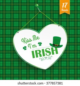 Green irish tartan background for St. Patrick's Day with paper heart. Eps 10 vector file.