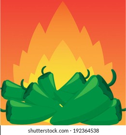 Green jalapeno chillies against a fire background 