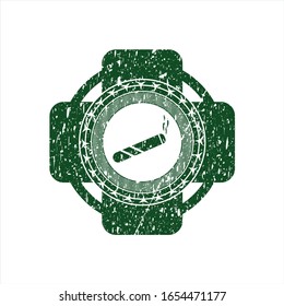 Articulación verde, icono de cigarrillo dentro de la junta de goma de la distracción con textura gruesa