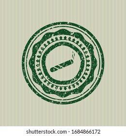 Green joint, cigarette icon inside distressed rubber texture