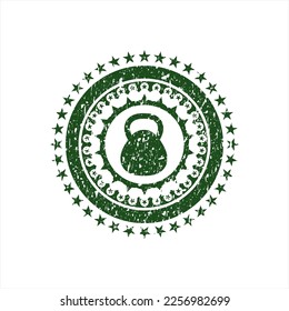 Green kettlebell icon inside distress grunge seal. 