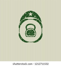 Green kettlebell icon inside rubber seal