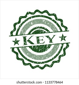 Green Key distressed rubber seal with grunge texture