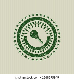 Icono de la tecla verde dentro del sello de goma con grifo. 