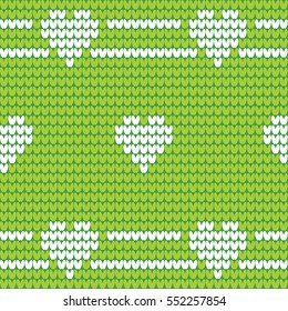 Green knitted seamless pattern with white hearts. Knitted design for invitations, greeting cards, messages, banners. Vector illustration
