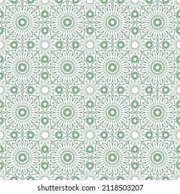 Green lace on a white background. Seamless pattern for fabric design, textiles, scrapbooks, desktop, covers