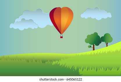 green landscape and air balloon