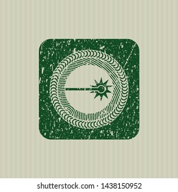 Green laser icon inside rubber grunge seal