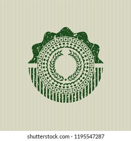 Green laurel wreath icon inside rubber grunge stamp