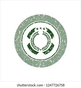 Green laurel wreath icon inside rubber grunge stamp