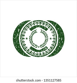 Green laurel wreath icon inside grunge stamp