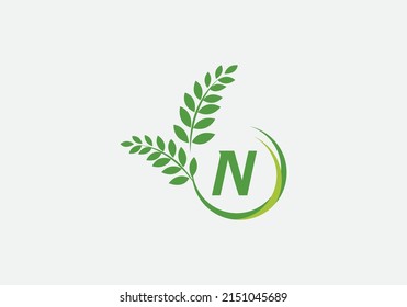 Green laurel wreath logo vector and circle icon letter and alphabets design