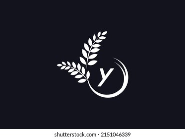 Diseño de letras y alfabetos del símbolo de la corona del laurel verde vectorial y del icono circular