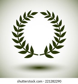 Green laurel wreath on white background.