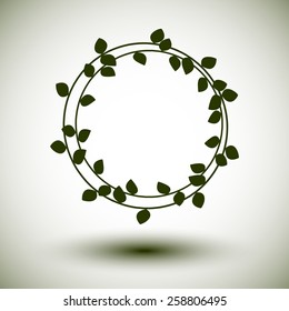 Green laurel wreath on white background.