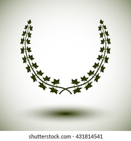 Green laurel wreath on white background.