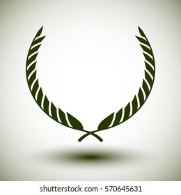 Green laurel wreath on white background.