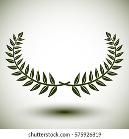 Green laurel wreath on white background.