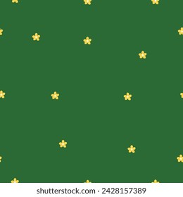 green lawn pattern and many small daisies