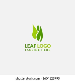 Green Leaf eco organic logo icon vector design. Abstract nature can be used for Healthy food, ecology, spa, business, diet, fitness and sport web icon. Illustration isolated on grey background.