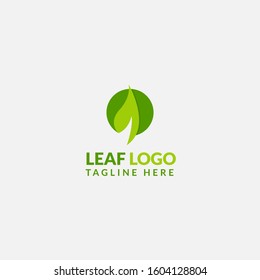 Green Leaf eco organic logo icon vector design. Abstract nature can be used for Healthy food, ecology, spa, business, diet, fitness and sport web icon. Illustration isolated on grey background.