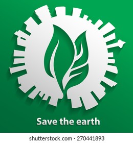 green leaf inside the earth and tower building around