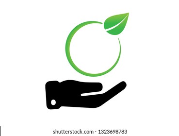 Green leaf on hand.Eco friendly and alternative energy concept