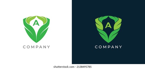 Símbolo del símbolo del logotipo Green Leaf and Shield Diseño con letra A. Plantilla de logotipo de ilustración de vector