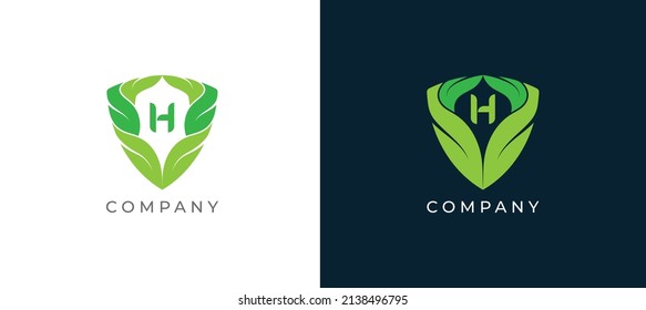 Green Leaf and Shield Logo sign icon symbol Design with Letter H. Vector illustration logo template