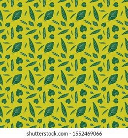 Green leaf with yellow background seamless pattern