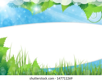 Green leaves and dense grass on a  blue sunny background