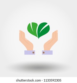 Green leaves in the form of heart on hand. Environmental protection. Icon. Vector. Flat.