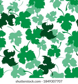 Green leaves of a grape. Seamless pattern for design. Vector illustration.