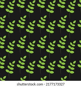 Green leaves on black background seamless pattern. Best for textile, wallpapers, wrapping paper, package and web design.