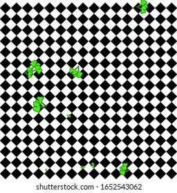 Green leaves on a geometric black-white backdrop