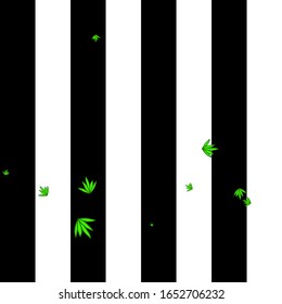 Green leaves on a geometric black-white backdrop