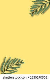 Green leaves on yellow background. Design space and copy space. Fantasy floral leaf art illustration. Decoration elements vector