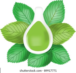 Green leaves of tea round a white cup of tea