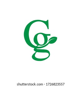 letra verde logotipo de CG con ilustración de hoja
