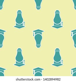 Green Light bulb and graduation cap icon isolated seamless pattern on yellow background. University Education concept. Vector Illustration