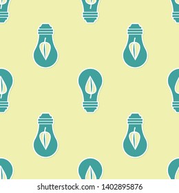 Green Light bulb with leaf icon isolated seamless pattern on yellow background. Eco energy concept. Alternative energy concept. Vector Illustration