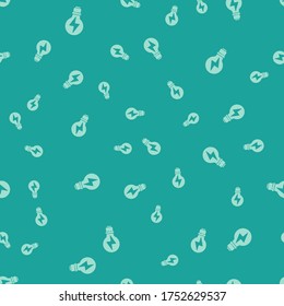 Green Light bulb with lightning symbol icon isolated seamless pattern on green background. Light lamp sign. Idea symbol.  Vector